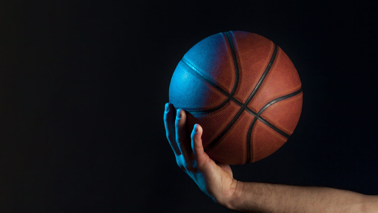 front-view-basketball-held-by-male-hand-1280x720.jpg